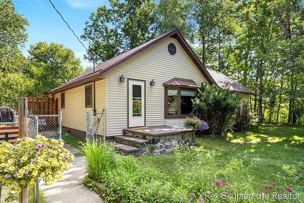 8 Acres of Land with Home for Sale in White Cloud, Michigan