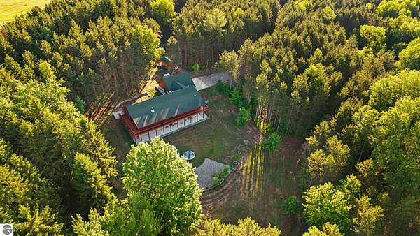 25 Acres of Recreational Land with Home for Sale in South Boardman, Michigan