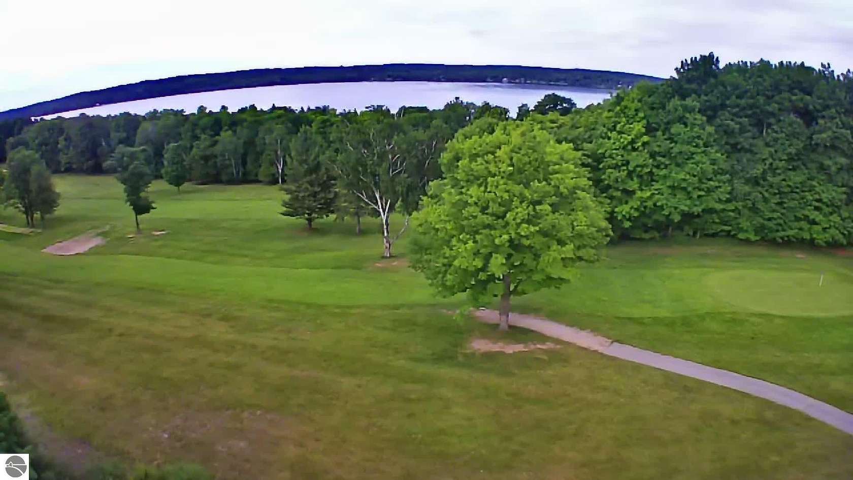 0.65 Acres of Residential Land for Sale in Kewadin, Michigan