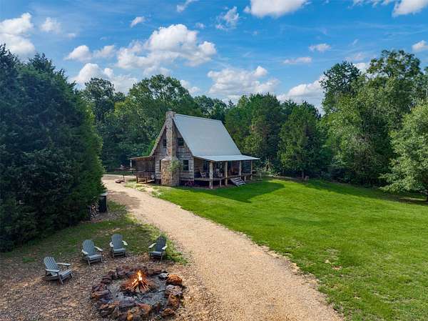 38.2 Acres of Recreational Land with Home for Sale in Montalba, Texas