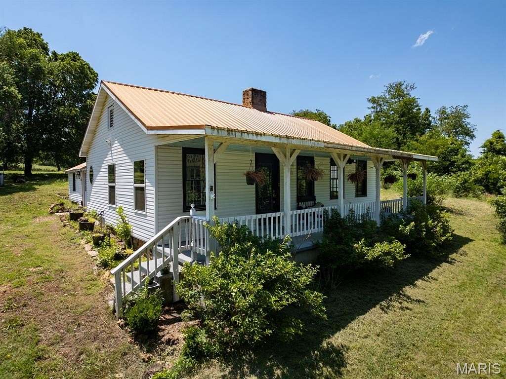 6.73 Acres of Land with Home for Sale in Davisville, Missouri