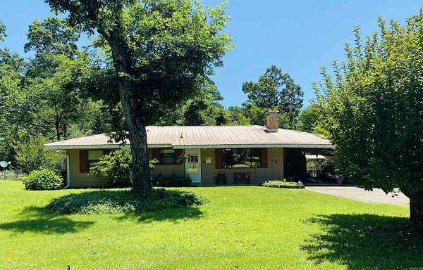 2.1 Acres of Land with Home for Sale in Cove, Arkansas