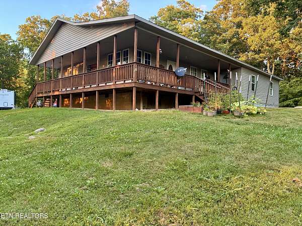 5.2 Acres of Land with Home for Sale in Pioneer, Tennessee