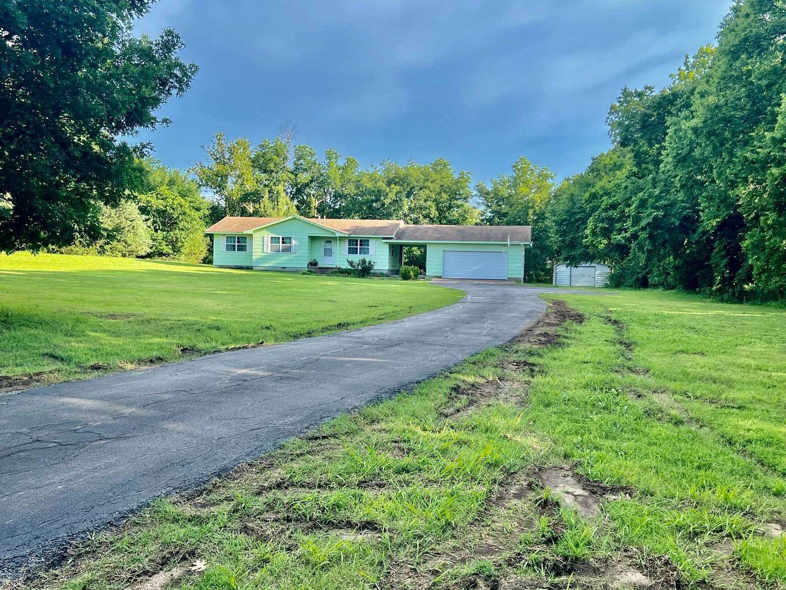 2.2 Acres of Land with Home for Sale in Coffeyville, Kansas