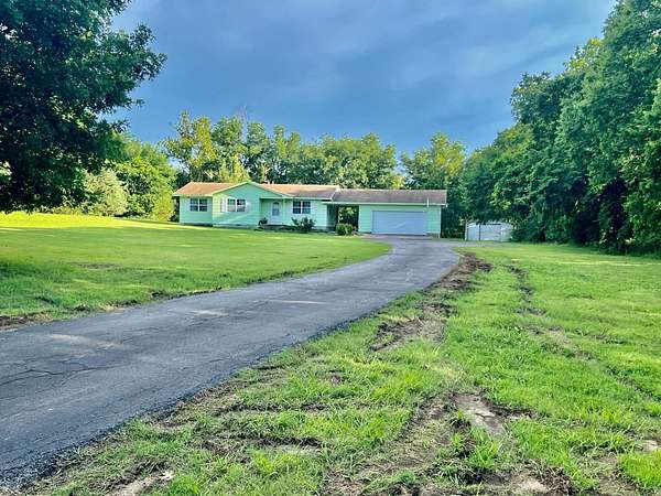 2.2 Acres of Land with Home for Sale in Coffeyville, Kansas