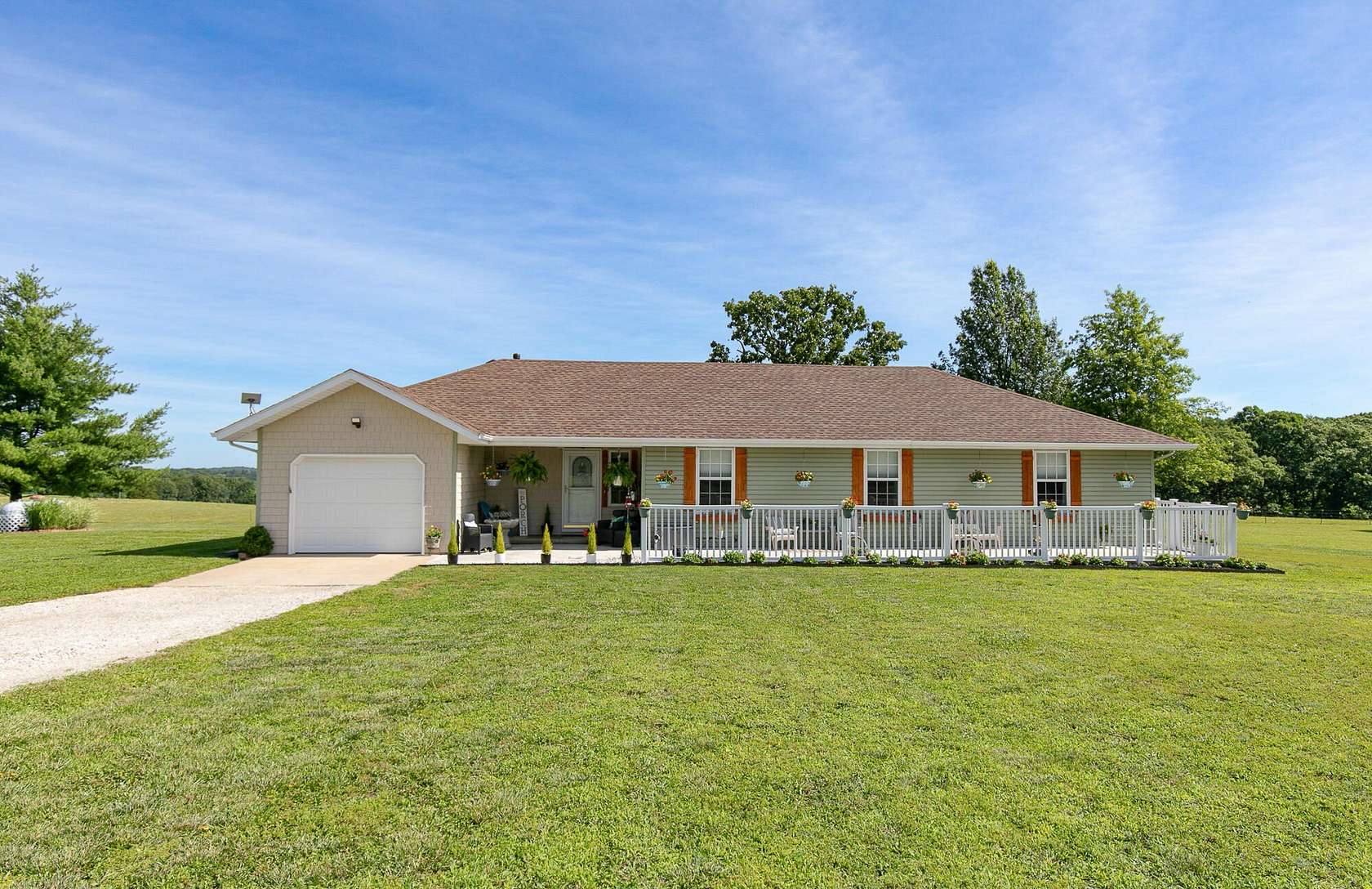9.73 Acres of Land with Home for Sale in Bois D'Arc, Missouri