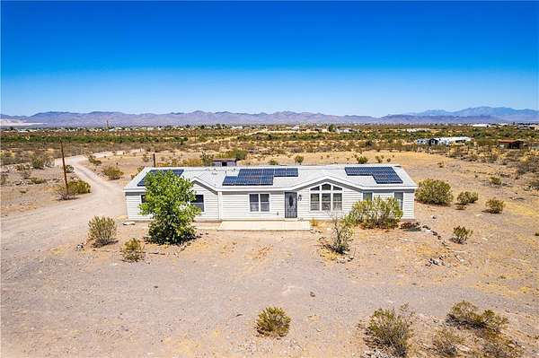 2.12 Acres of Land with Home for Sale in Golden Valley, Arizona