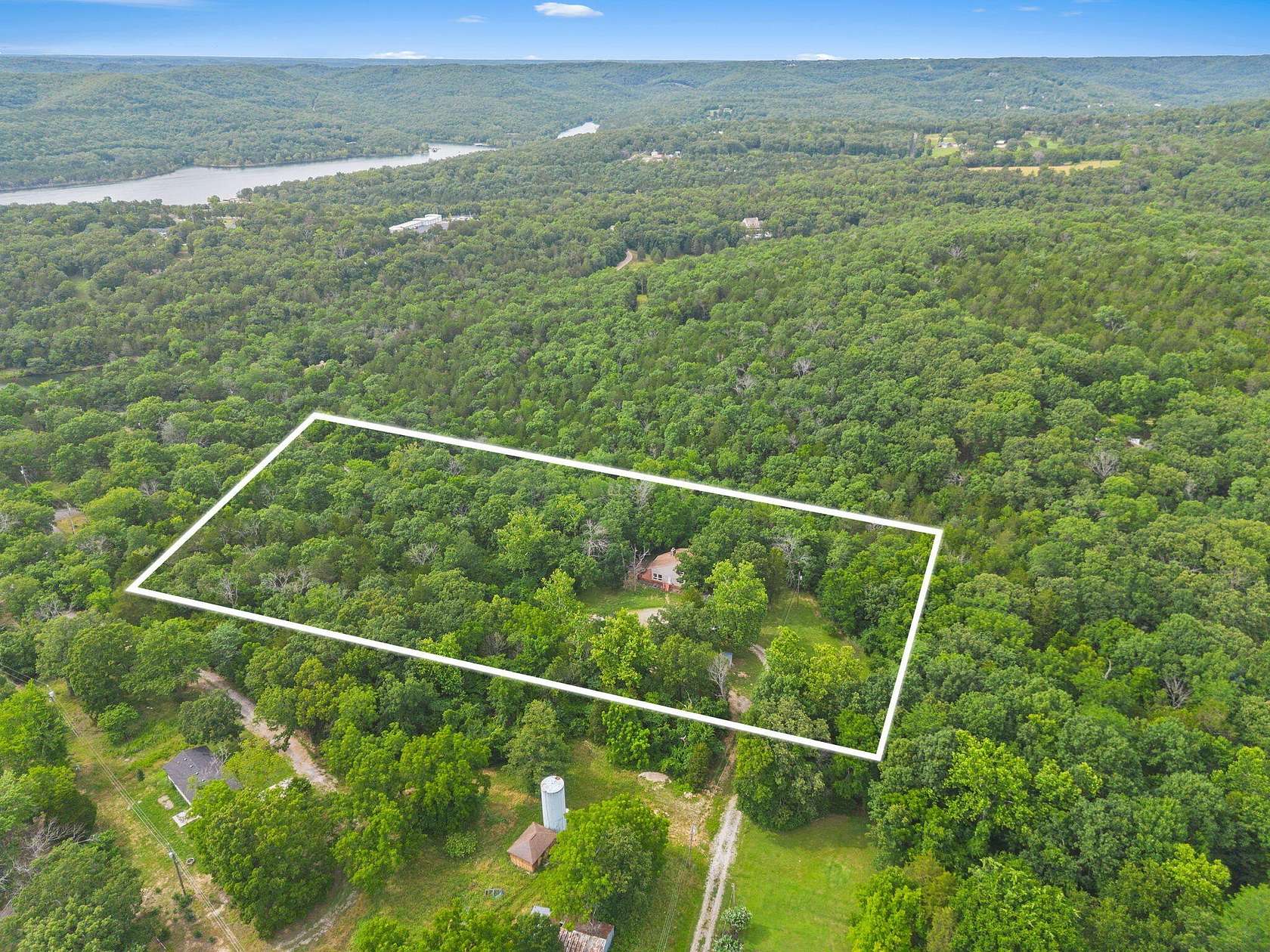 3.55 Acres of Land with Home for Sale in Reeds Spring, Missouri