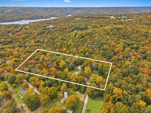 3.55 Acres of Land with Home for Sale in Reeds Spring, Missouri