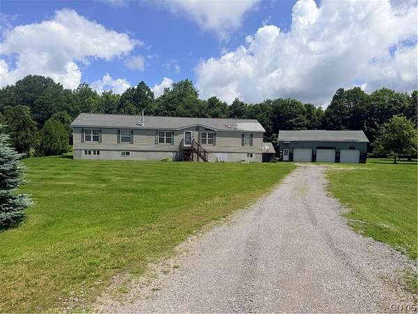 6.78 Acres of Land with Home for Sale in Black River, New York