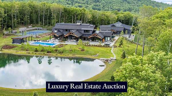 11.6 Acres of Land with Home for Auction in Stowe, Vermont