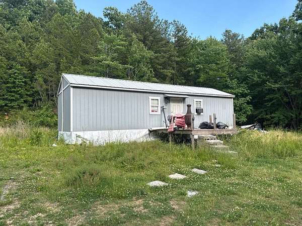 2.8 Acres of Land with Home for Sale in Ooltewah, Tennessee