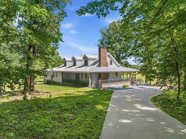 7.3 Acres of Land with Home for Sale in Paris, Tennessee