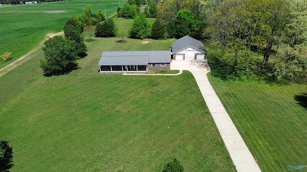 1.57 Acres of Land with Home for Sale in Rogersville, Alabama