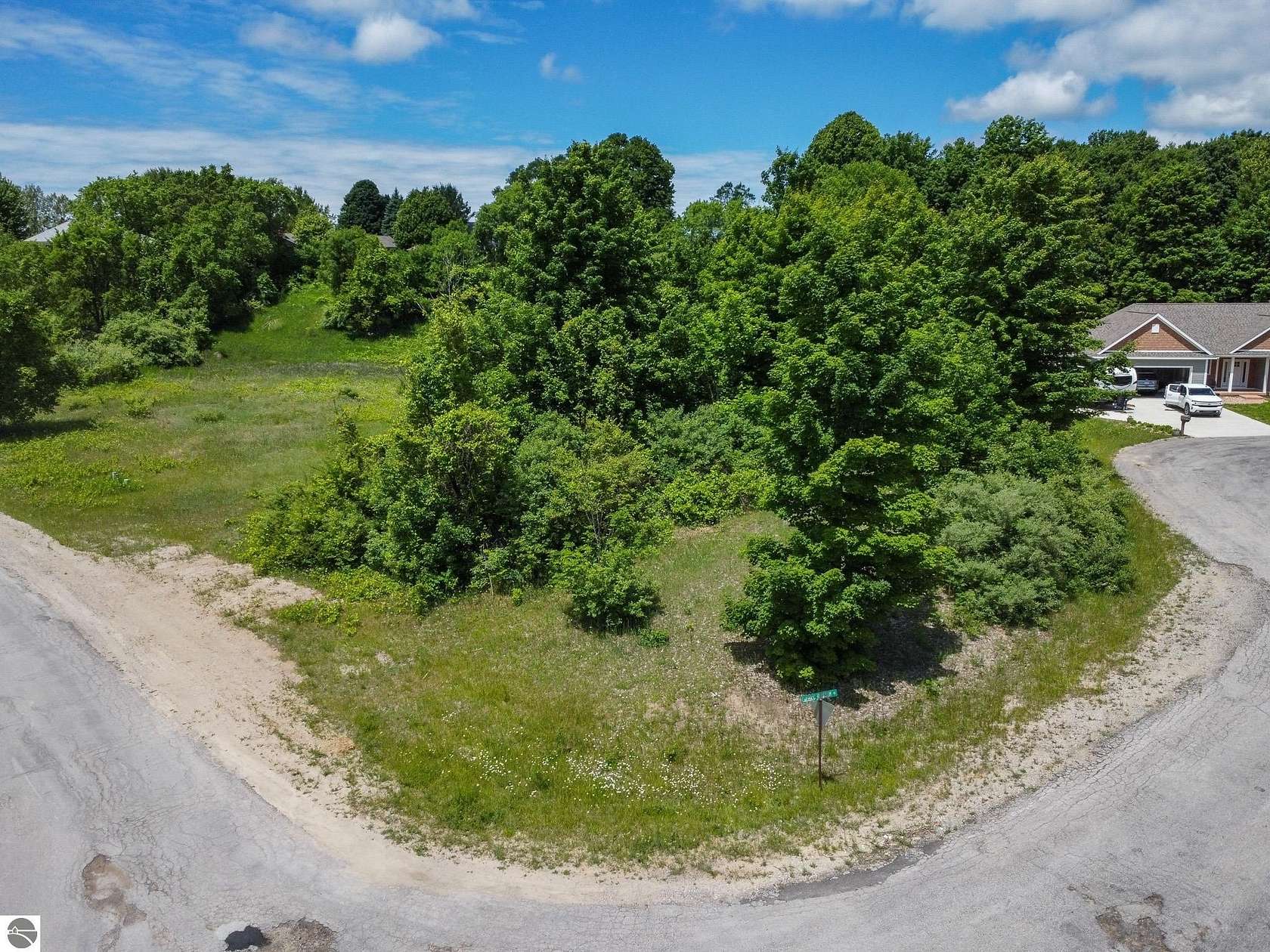 0.86 Acres of Residential Land for Sale in Suttons Bay, Michigan