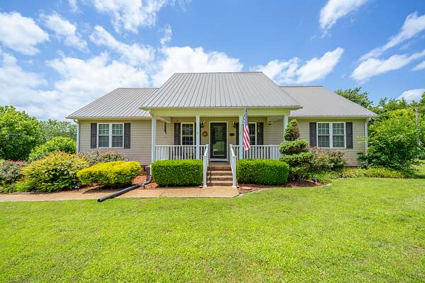 2.52 Acres of Land with Home for Sale in Clifton, Tennessee