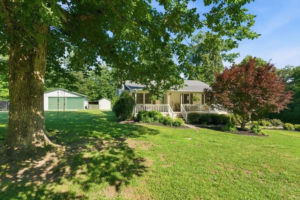 2 Acres of Land with Home for Sale in Charlotte, Tennessee