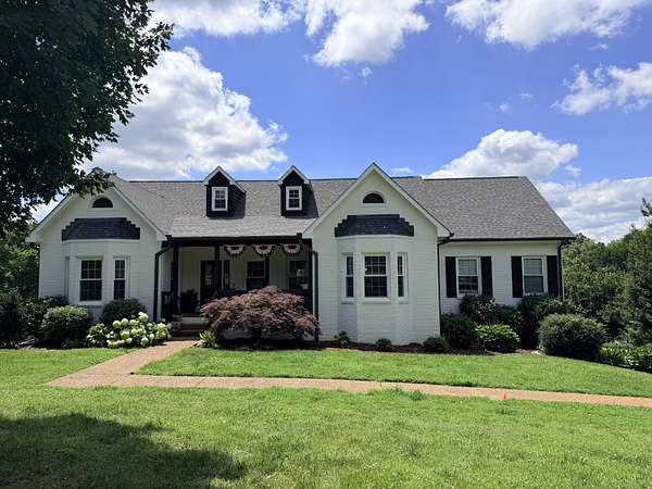 5.57 Acres of Land with Home for Sale in College Grove, Tennessee