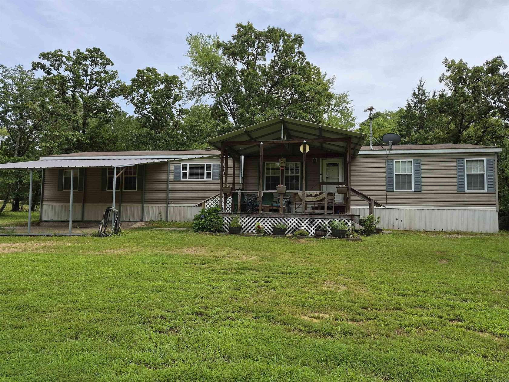 10.7 Acres of Recreational Land with Home for Sale in Pearcy, Arkansas