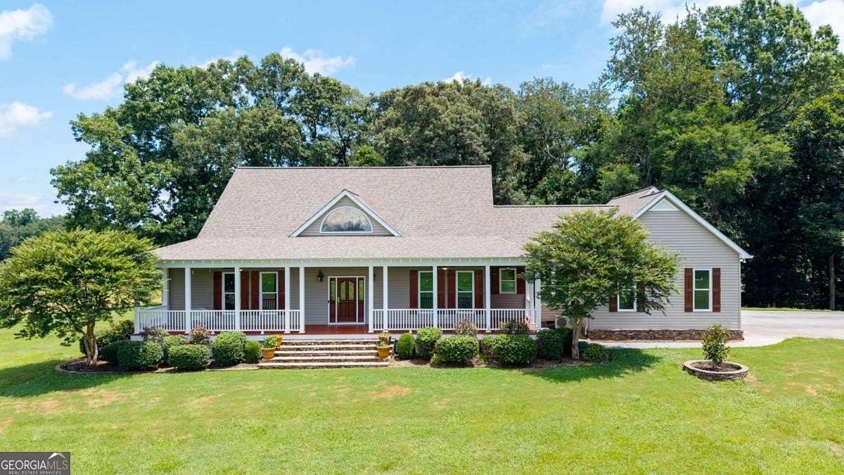 7.12 Acres of Land with Home for Sale in Calhoun, Georgia