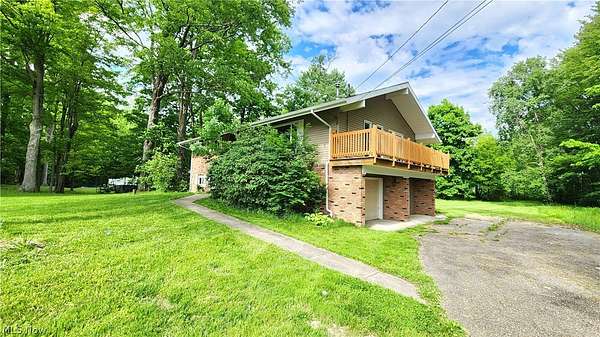 1.5 Acres of Land with Home for Sale in Montville, Ohio