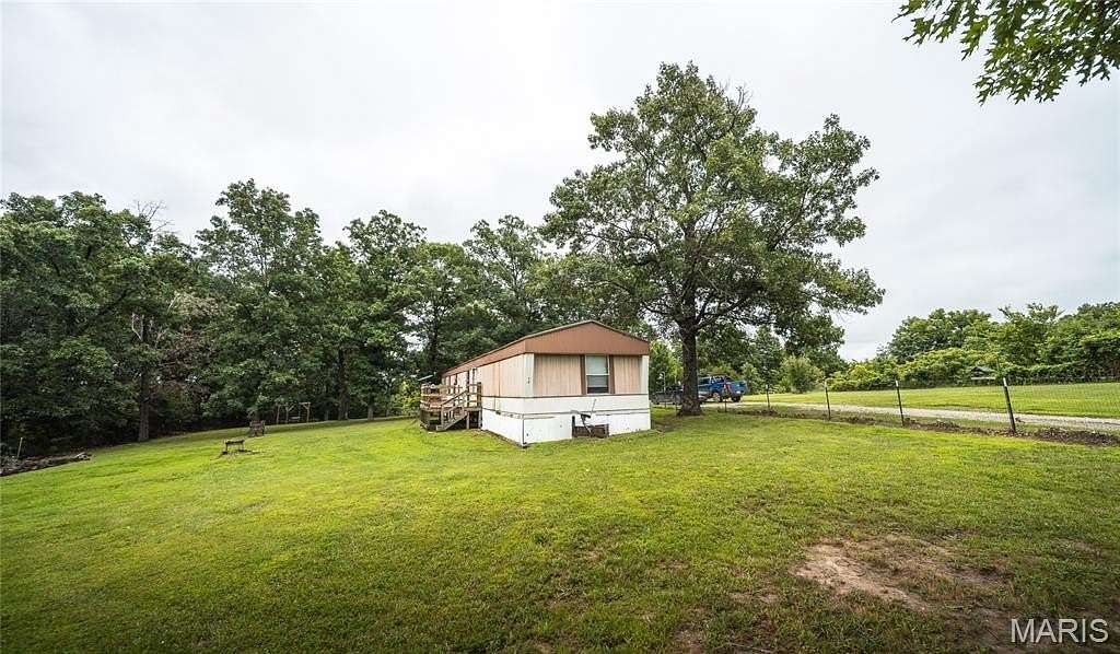 5.7 Acres of Land with Home for Sale in Richland, Missouri