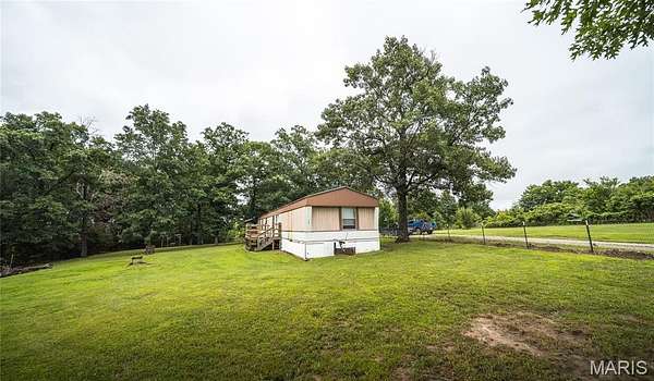 5.7 Acres of Land with Home for Sale in Richland, Missouri