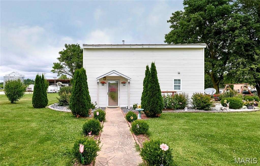 7 Acres of Land with Home for Sale in Troy, Missouri