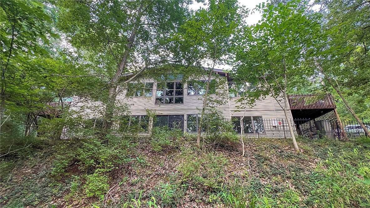 5.6 Acres of Land with Home for Sale in Fayetteville, Arkansas