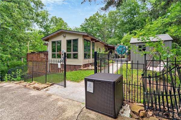 5.6 Acres of Land with Home for Sale in Fayetteville, Arkansas
