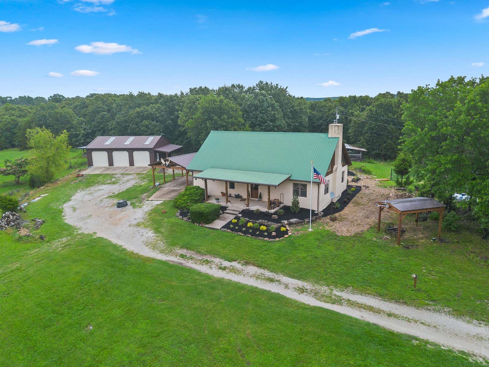 75 Acres of Land with Home for Sale in Taneyville, Missouri