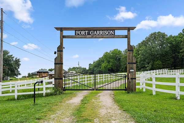 75 Acres of Land with Home for Sale in Taneyville, Missouri