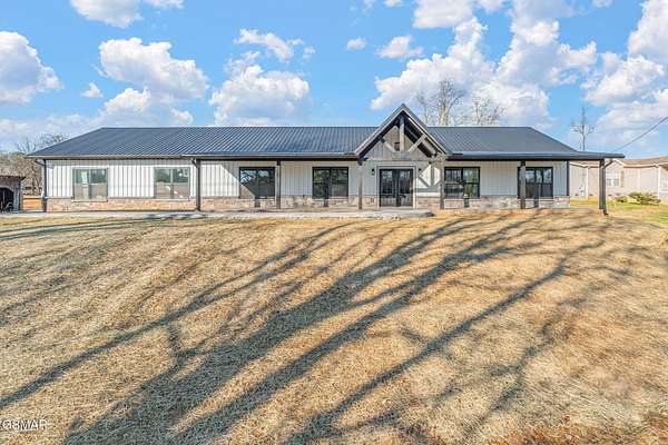 5 Acres of Land with Home for Sale in Strawberry Plains, Tennessee