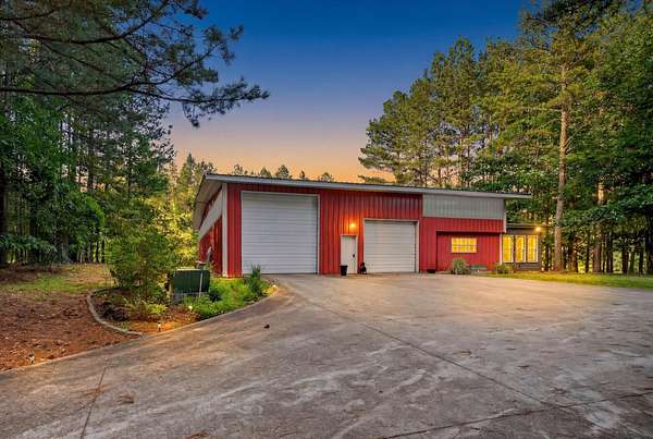 53.5 Acres of Recreational Land with Home for Sale in Indian Mound, Tennessee