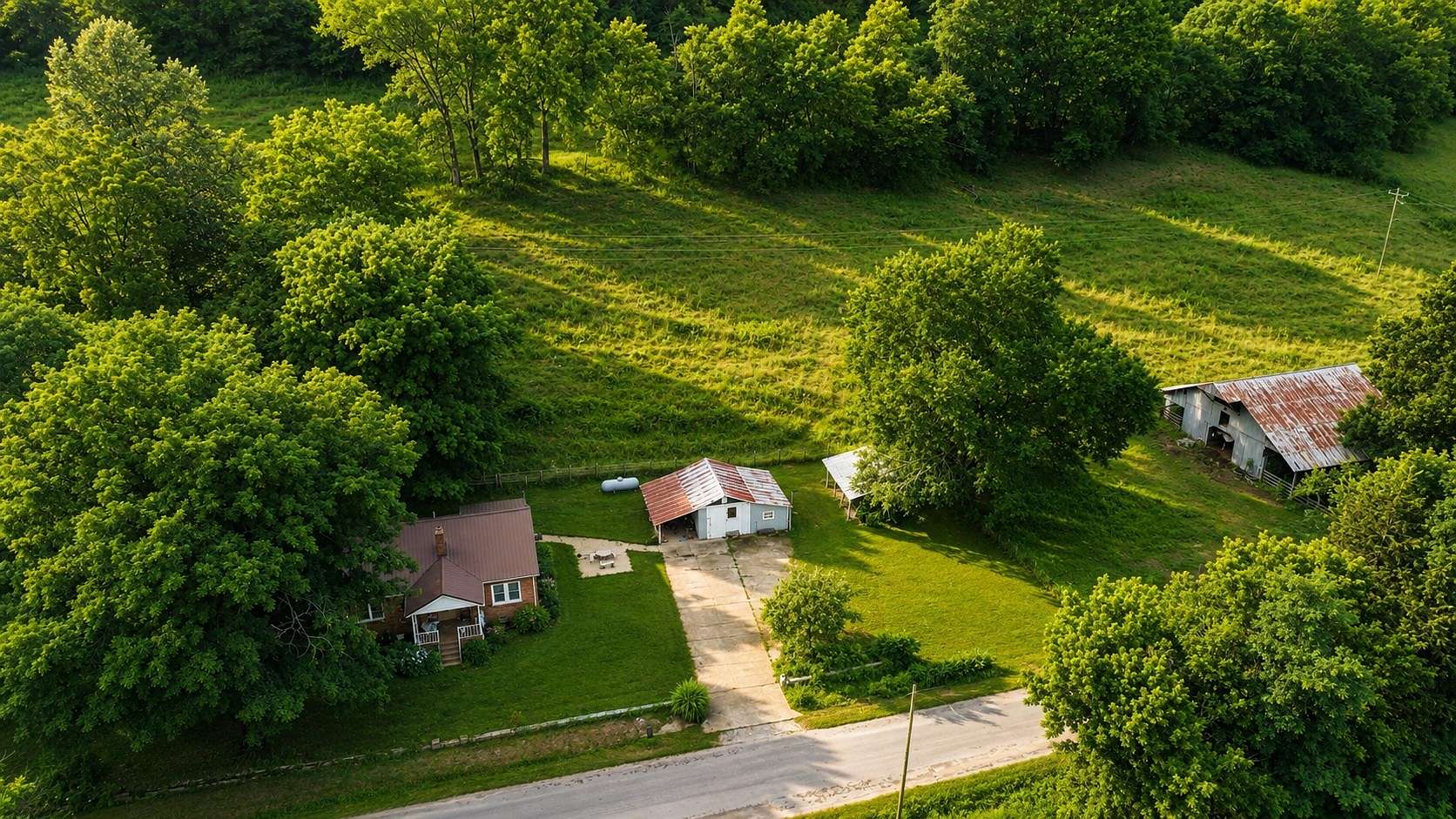5.58 Acres of Land with Home for Sale in Cornersville, Tennessee