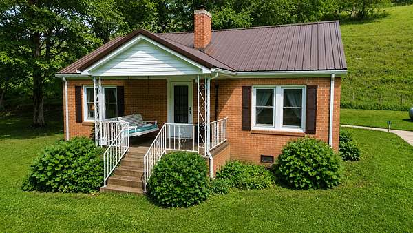 5.58 Acres of Land with Home for Sale in Cornersville, Tennessee
