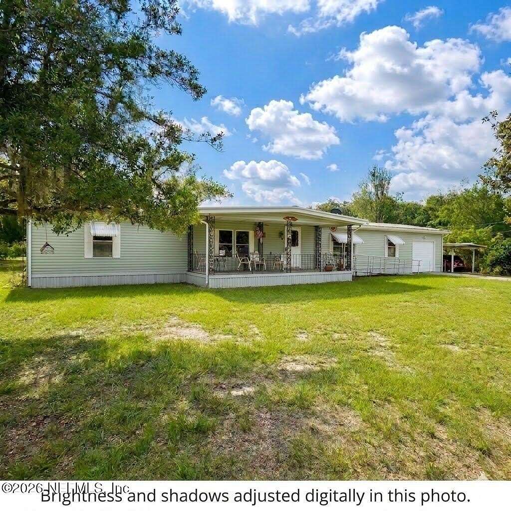 2.1 Acres of Land with Home for Sale in Interlachen, Florida