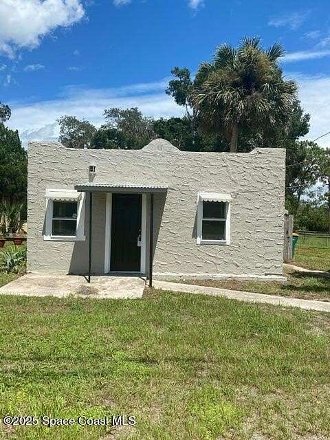 0.62 Acres of Land with Home for Lease in Mims, Florida
