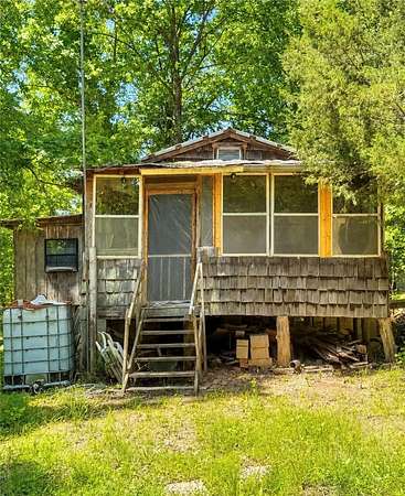 5 Acres of Land with Home for Sale in Marble Falls Township, Arkansas