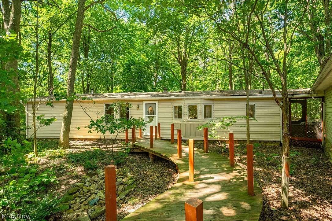 2 Acres of Land with Home for Sale in Dellroy, Ohio