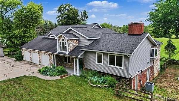 9.43 Acres of Land with Home for Sale in Dryden Township, Michigan