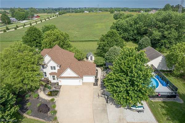 6.56 Acres of Land with Home for Sale in Louisville, Ohio