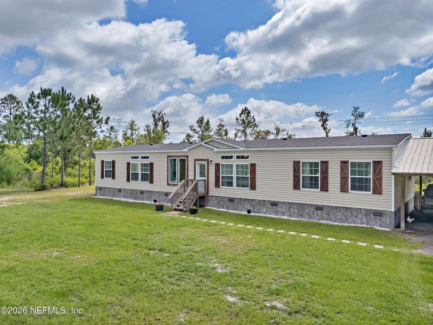 10.7 Acres of Land with Home for Sale in Hilliard, Florida