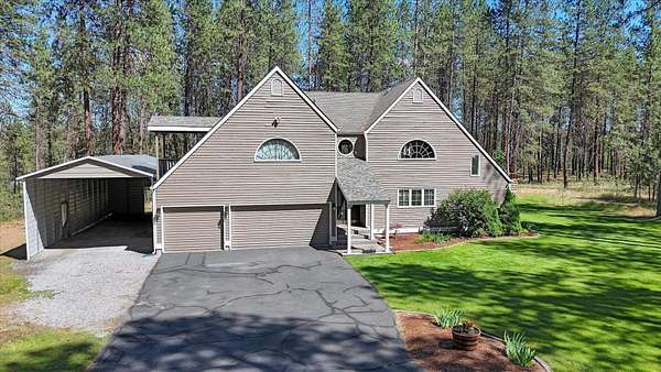 1.87 Acres of Land with Home for Sale in Colbert, Washington