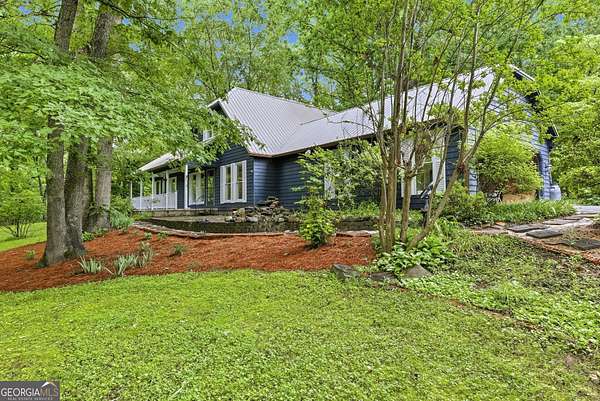 7.3 Acres of Land with Home for Sale in Cornelia, Georgia