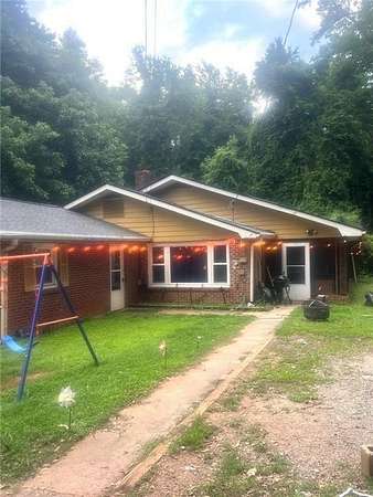 2 Acres of Land with Home for Sale in Lithonia, Georgia