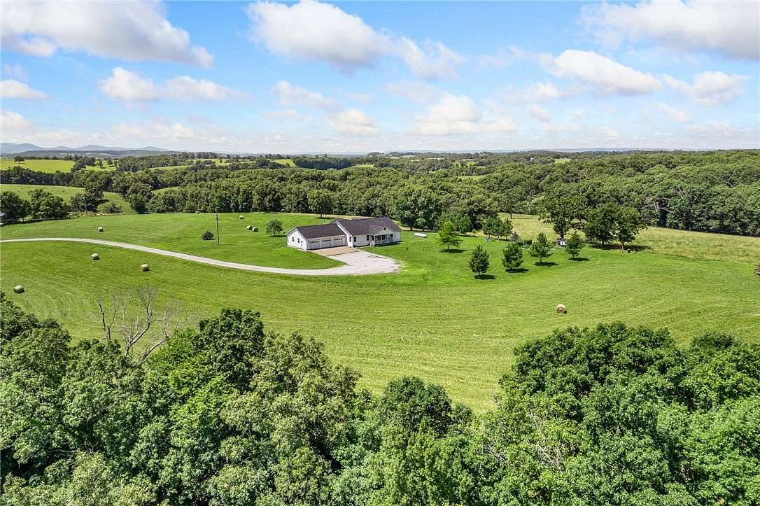 13.7 Acres of Land with Home for Sale in Harrison, Arkansas