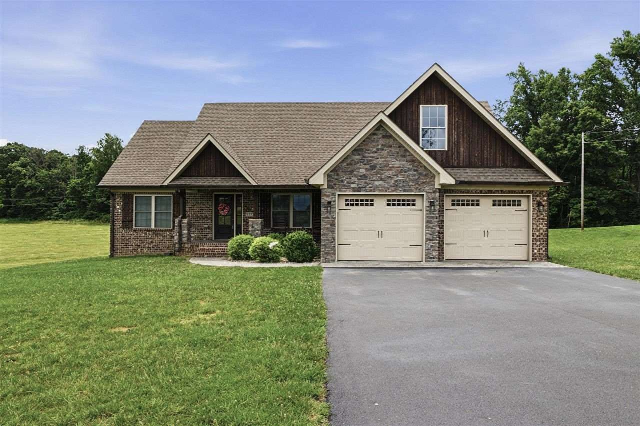 1.57 Acres of Land with Home for Sale in Scottsville, Kentucky