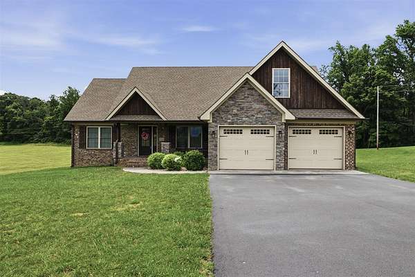 1.57 Acres of Land with Home for Sale in Scottsville, Kentucky