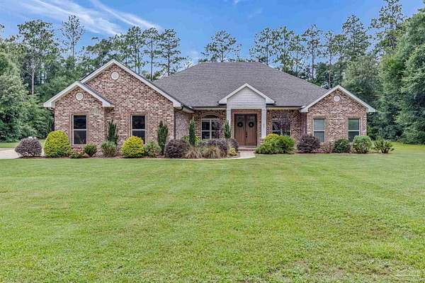 3.44 Acres of Land with Home for Sale in Milton, Florida